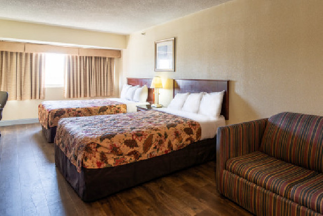 Dominion Inn Suites Guestroom